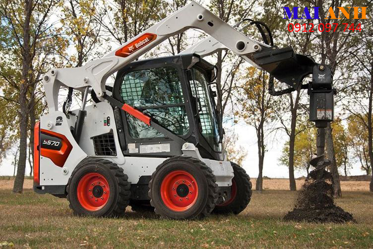 Máy xúc lật Bobcat S570 gắn đầu khoan